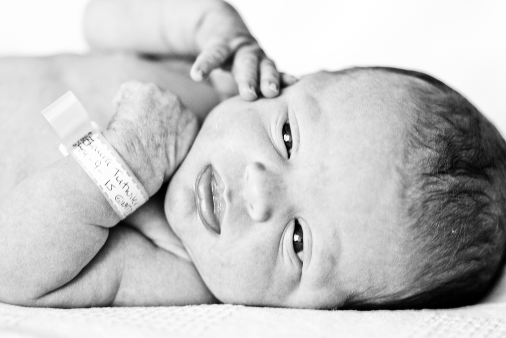 Black and white photo of newborn Aleythia Grace