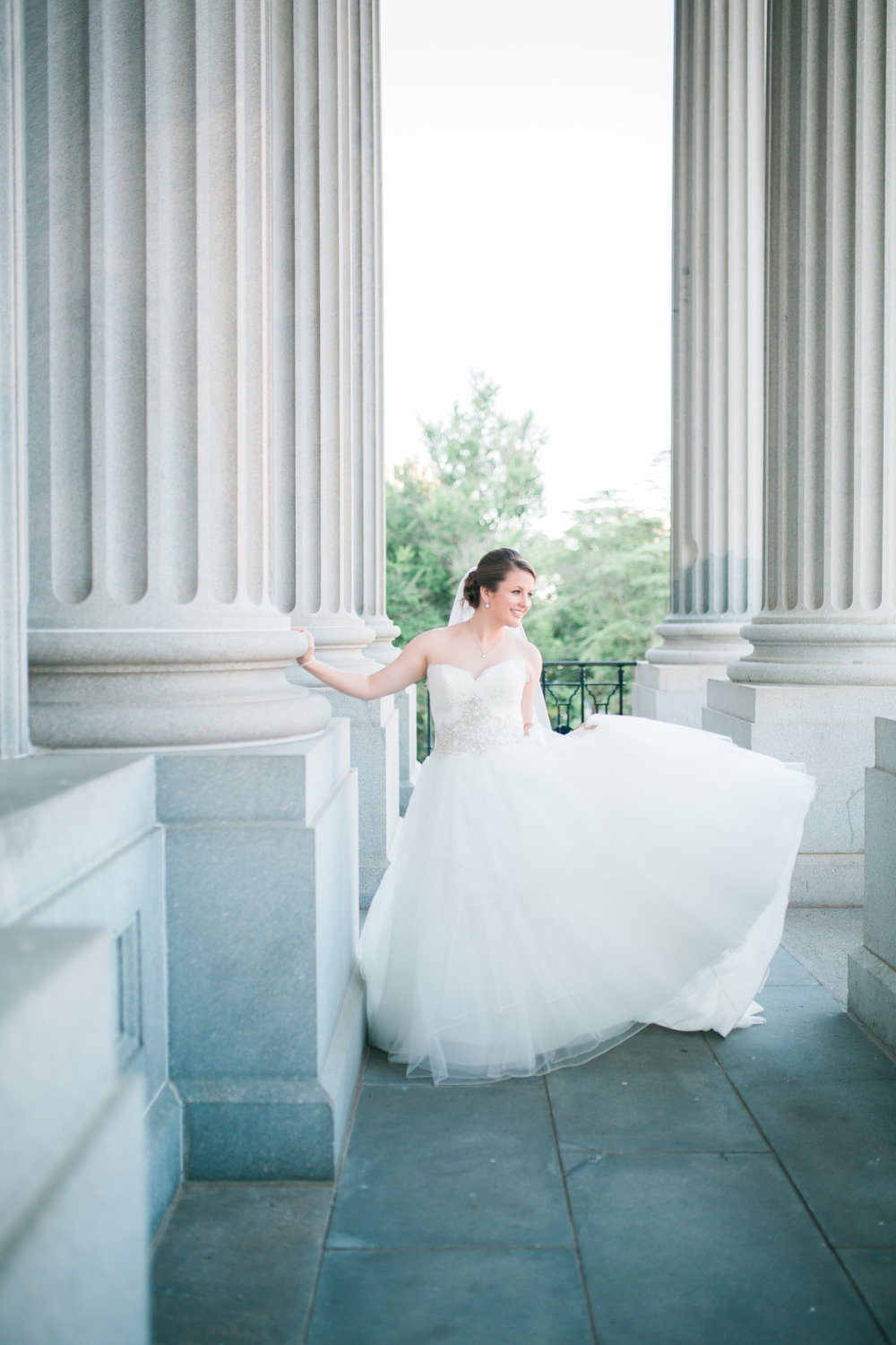 Bride leaning on Statehouse Column