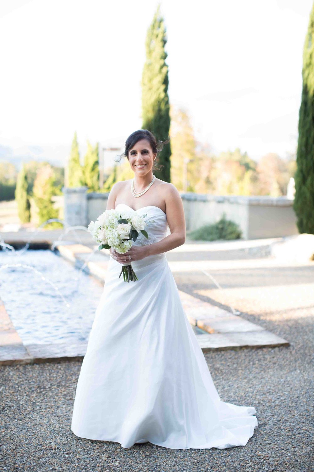 Bride Portrait with Water Fountain