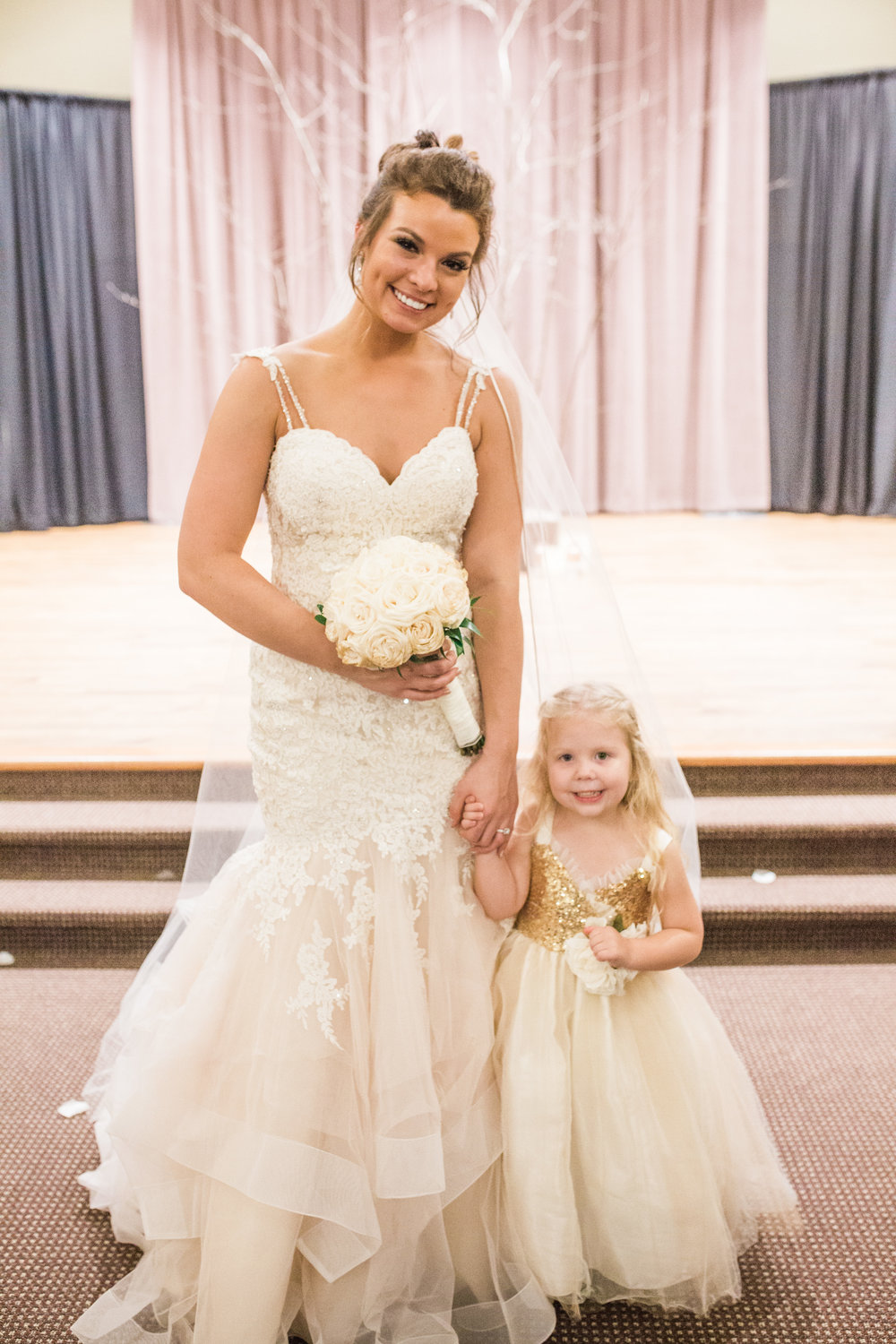 Bride and Flower Girl at alter