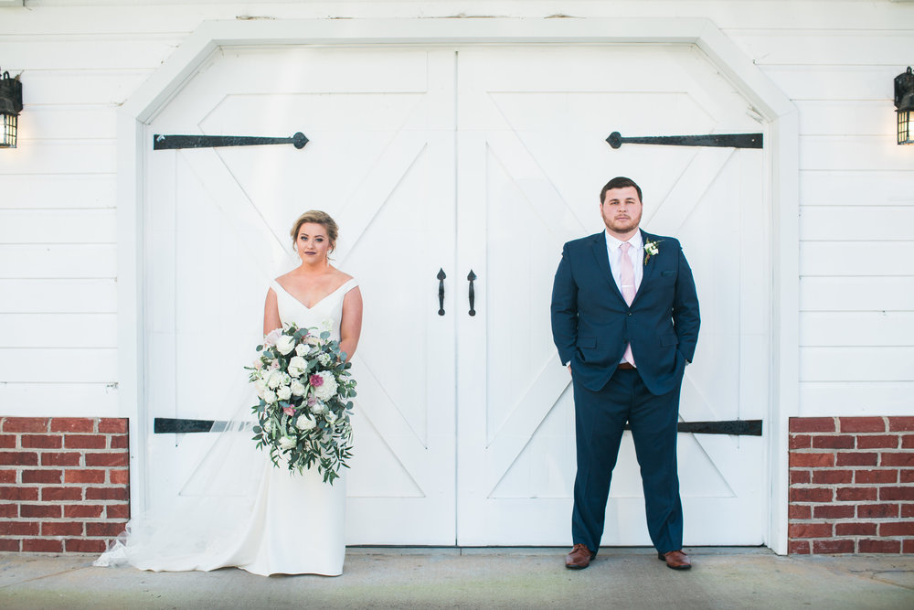 Bride and Groom outside the door
