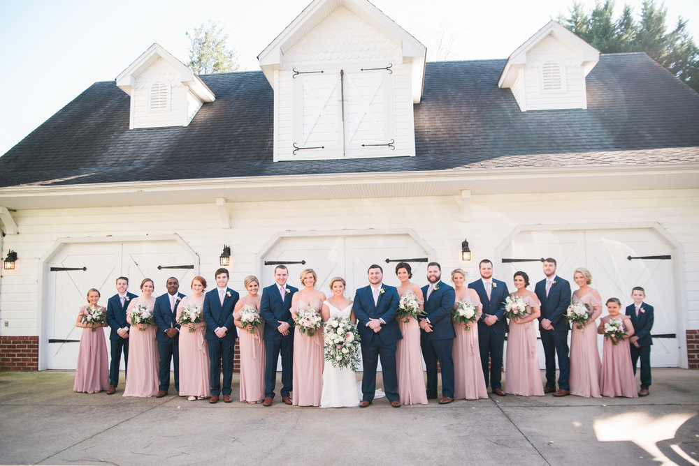 Photo of Wedding Party outside Venue