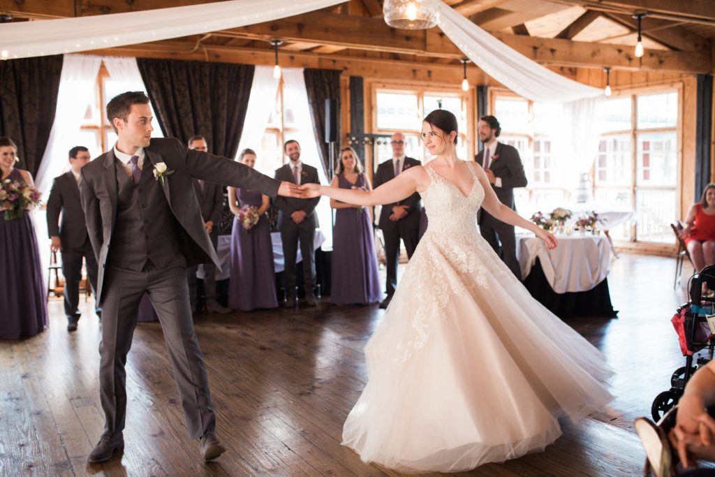 Husband and wife dance at reception