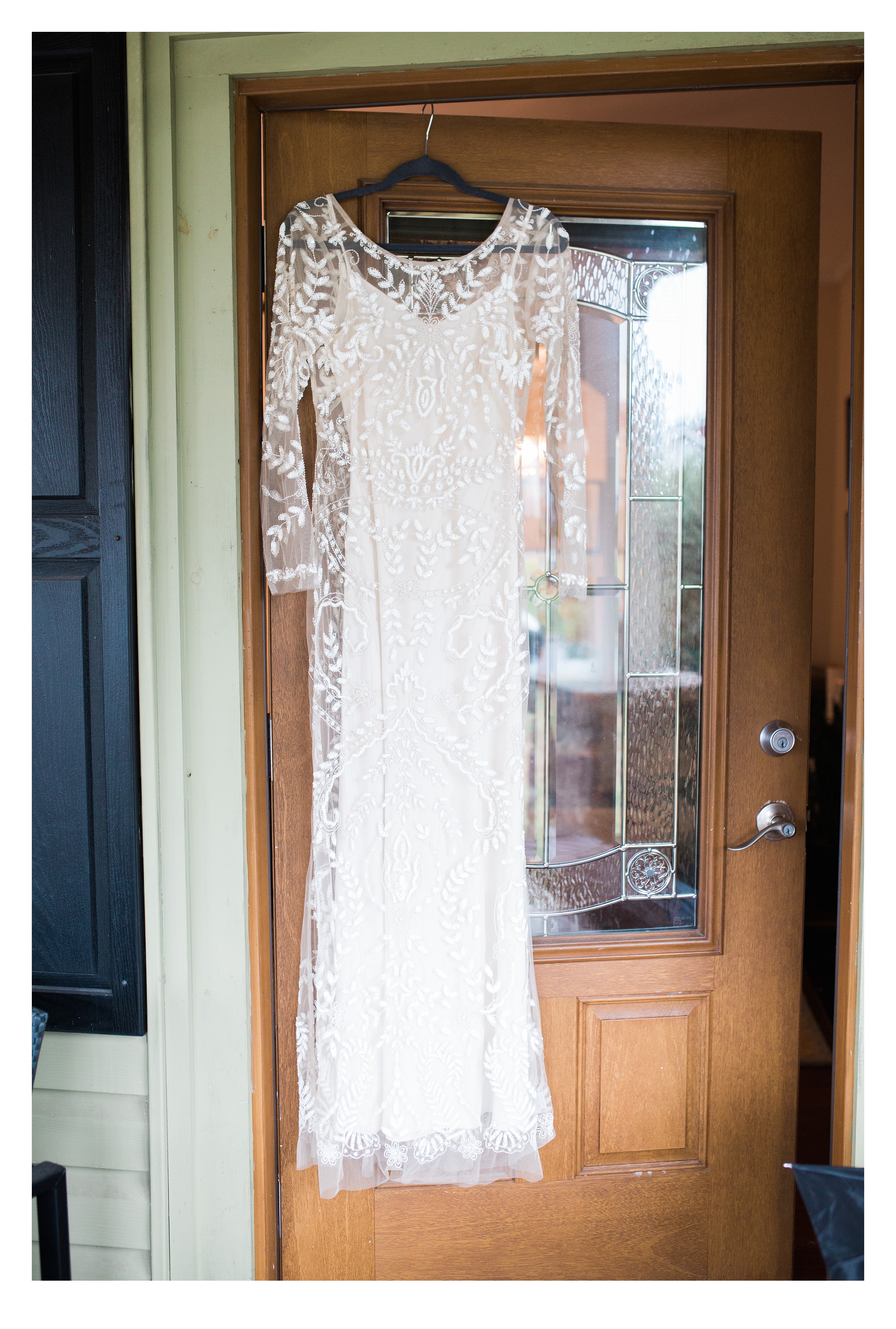 Wedding Dress hanging on Door