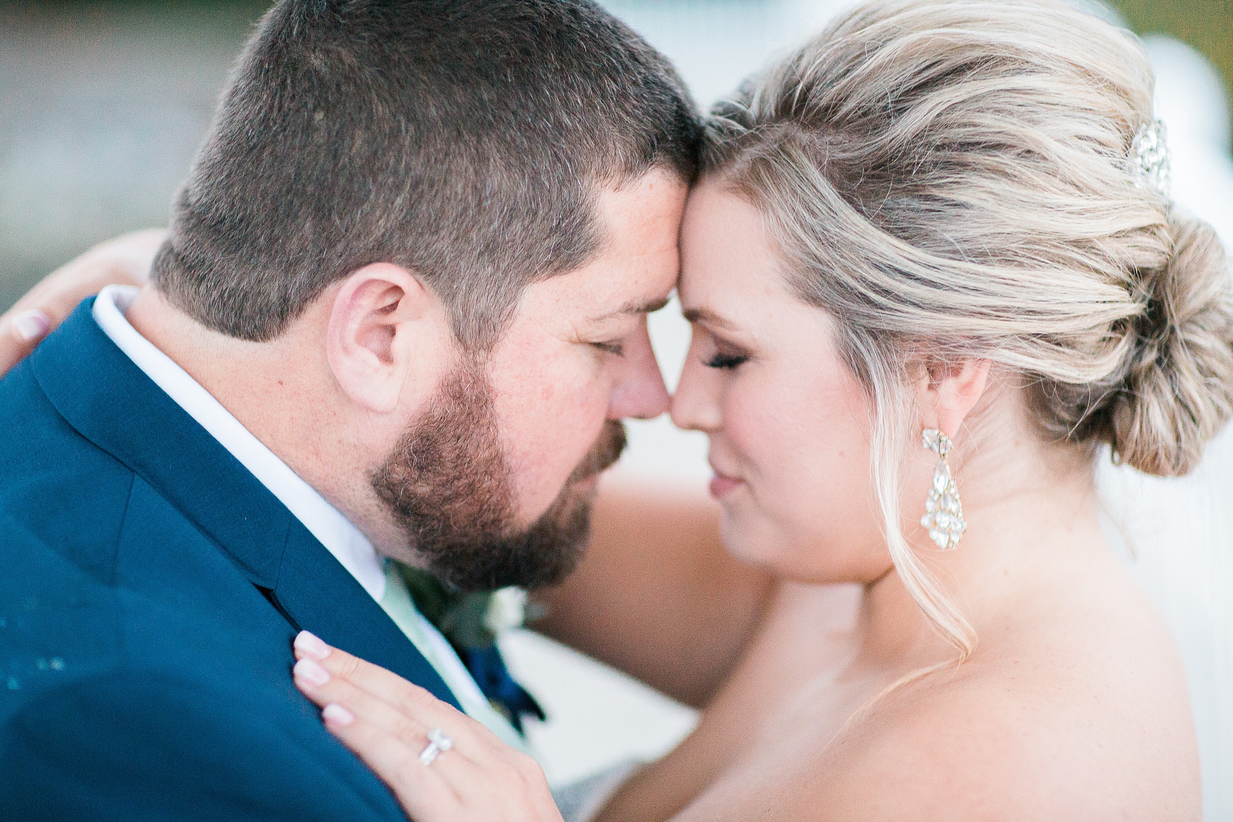 Bride and Groom touching noses