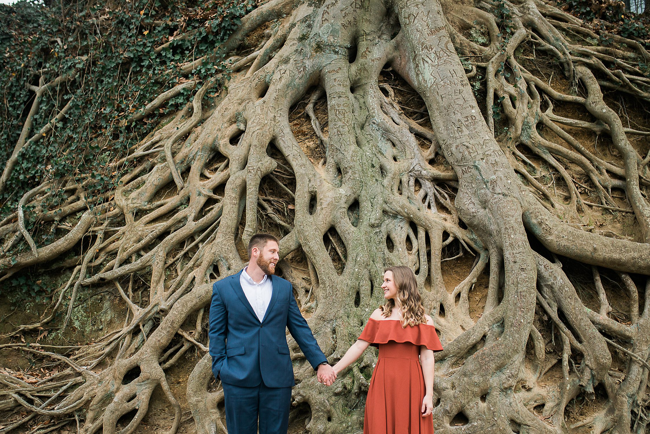Couple in front of Large Tree Roots