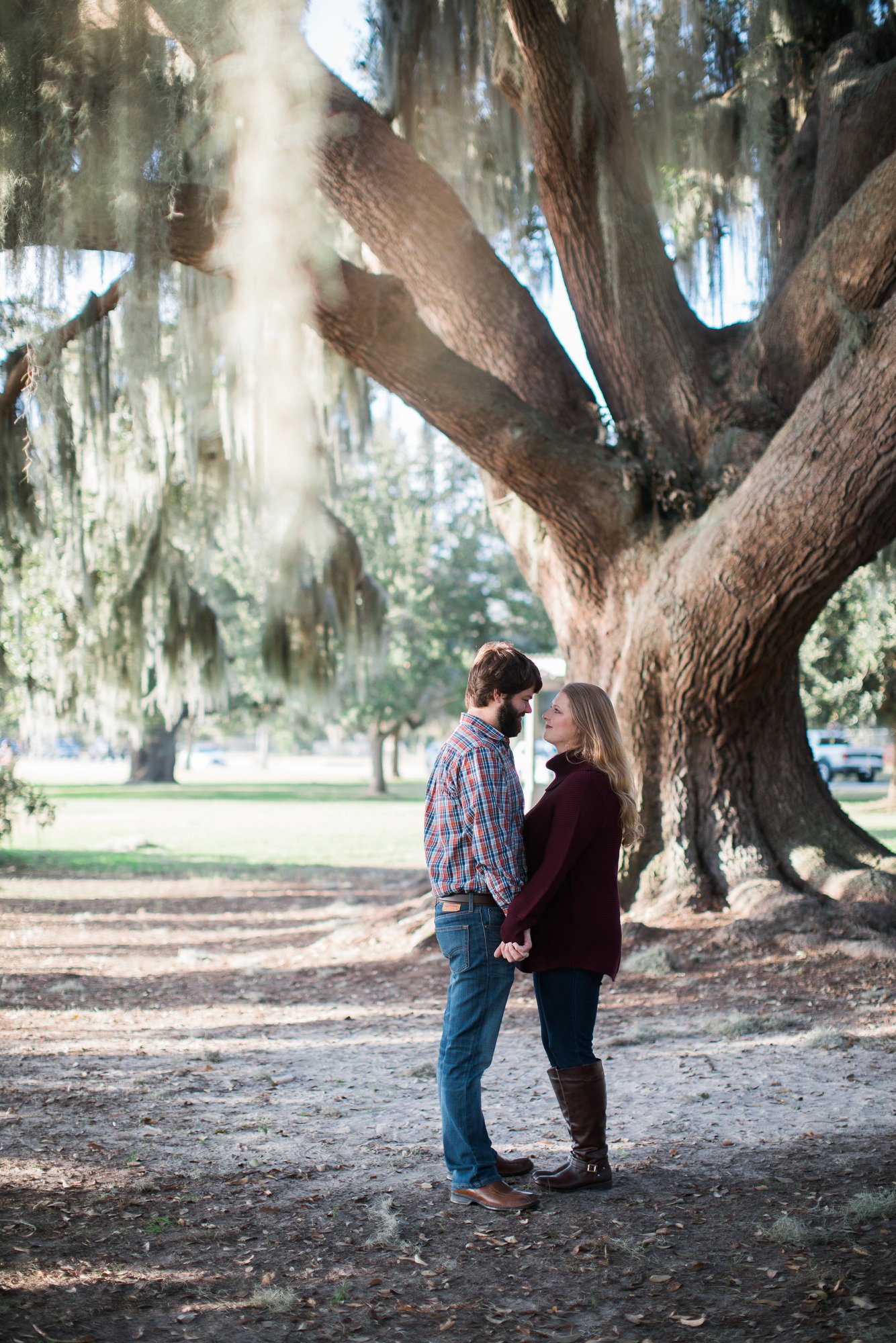 Kissing in front of a large Tree in New Orleans